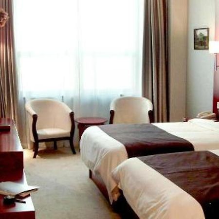 Rome Business Hotel Tianjin Habitación foto